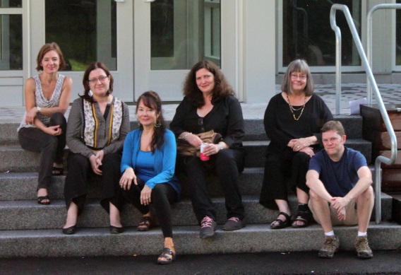 group of people sitting on steps